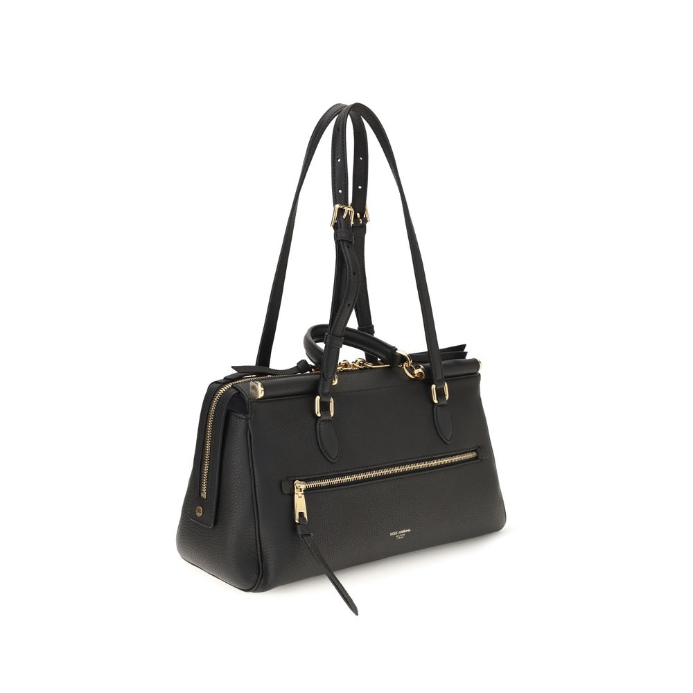 Shoulder Bag by Dolce & Gabbana for women in bos taurus calf leather black & gold features an effortlessly chic silhouette with a secure zipper, ample , and versatile shoulder-strap, adjustable-strap & handle for effortlessly chic everyday luxury.