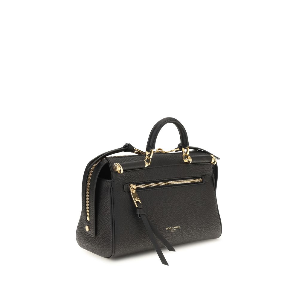 Handbag by Dolce & Gabbana for women in bos taurus calf leather black & signature presents a ornamental silhouette, showcasing a secure zipper, ample , and versatile shoulder-strap & adjustable-strap for a ornamental finish.