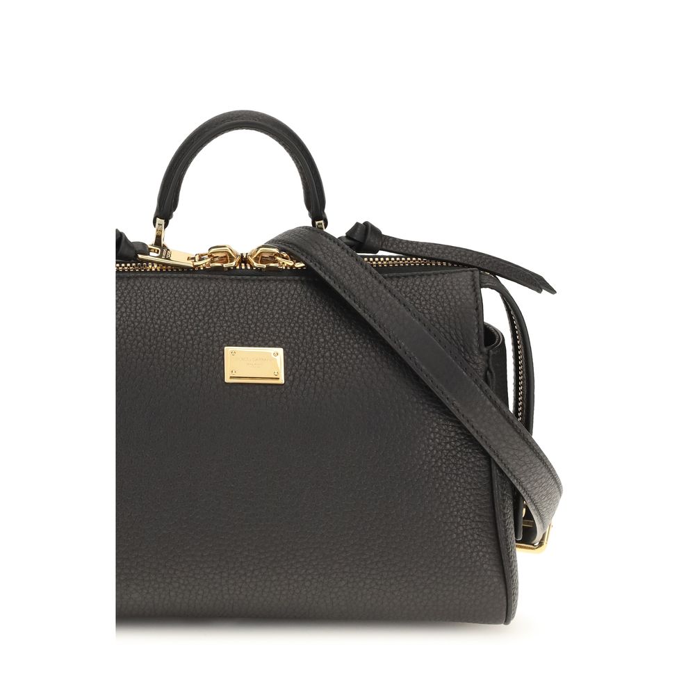 Handbag by Dolce & Gabbana for women in bos taurus calf leather black & signature features a exquisite silhouette, showcasing a secure zipper and exquisite with versatile shoulder-strap & adjustable-strap for a exquisite finish.
