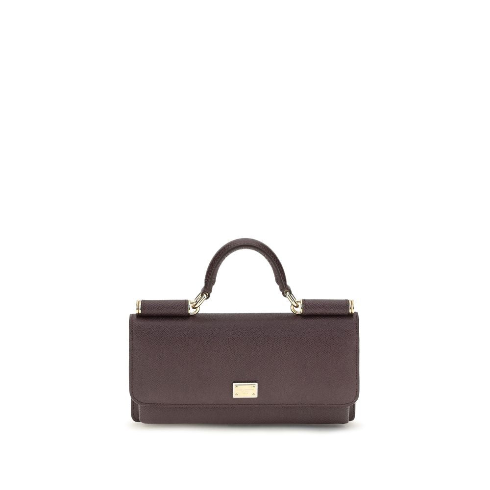 Micro Shoulder Flap Bag by Dolce & Gabbana for women in bos taurus calf leather brown & signature features a effortless chic silhouette with a secure flap, magnetic & button, ample , and versatile shoulder-strap & handle for a effortless chic finish.