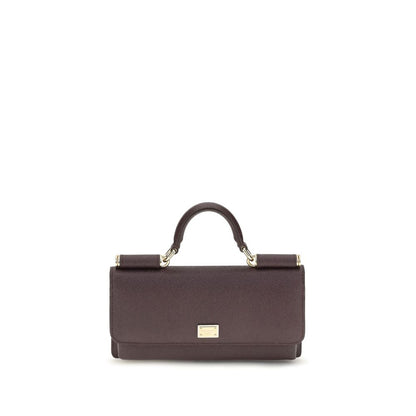 Micro Shoulder Flap Bag by Dolce & Gabbana for women in bos taurus calf leather brown & signature features a effortless chic silhouette with a secure flap, magnetic & button, ample , and versatile shoulder-strap & handle for a effortless chic finish.