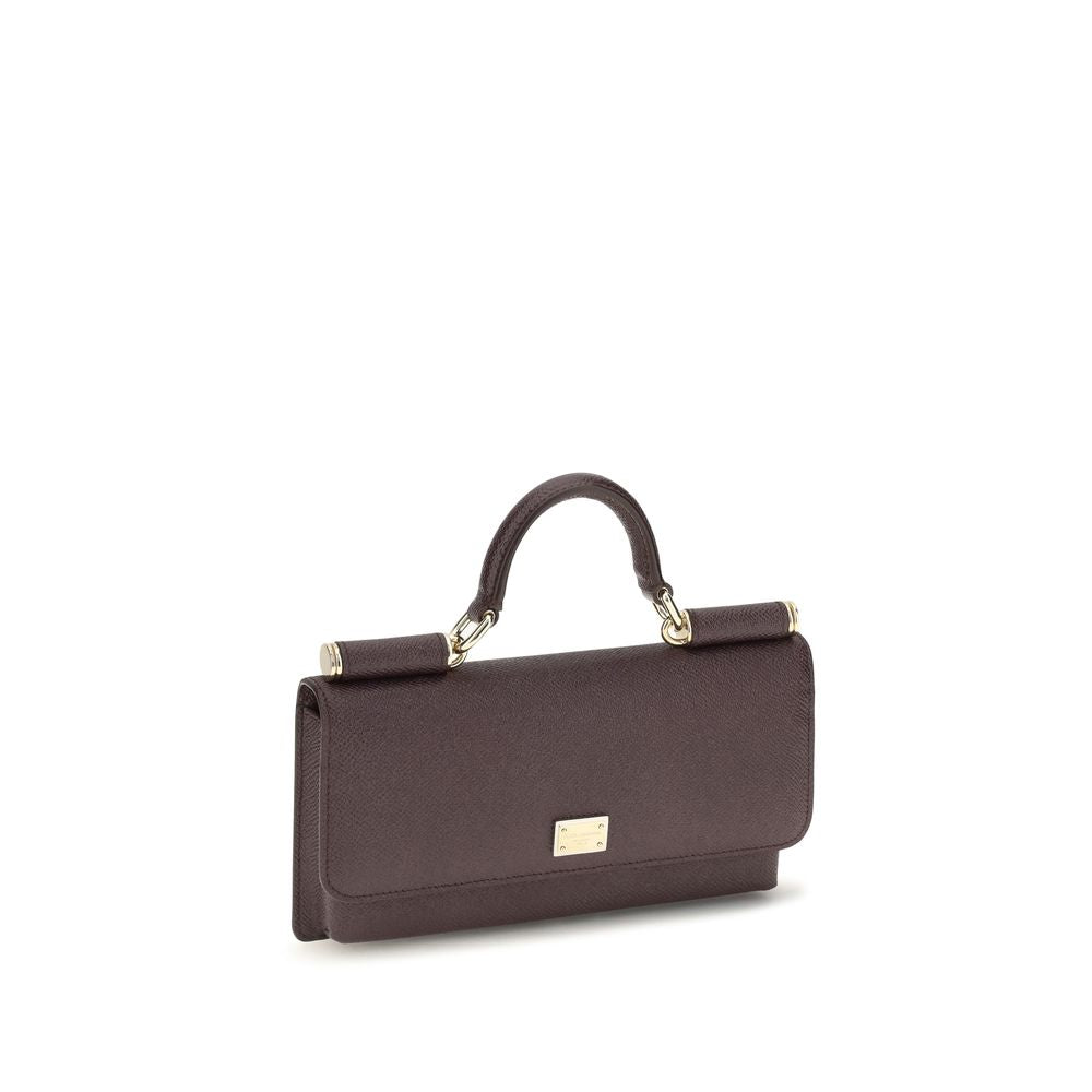 Micro Shoulder Flap Bag by Dolce & Gabbana for women in bos taurus calf leather brown & signature features a enviable silhouette, showcasing a secure flap, magnetic & button, ample , and enviable shoulder-strap & handle for a enviable finish.
