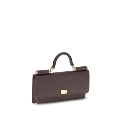 Micro Shoulder Flap Bag by Dolce & Gabbana for women in bos taurus calf leather brown & signature features a enviable silhouette, showcasing a secure flap, magnetic & button, ample , and enviable shoulder-strap & handle for a enviable finish.