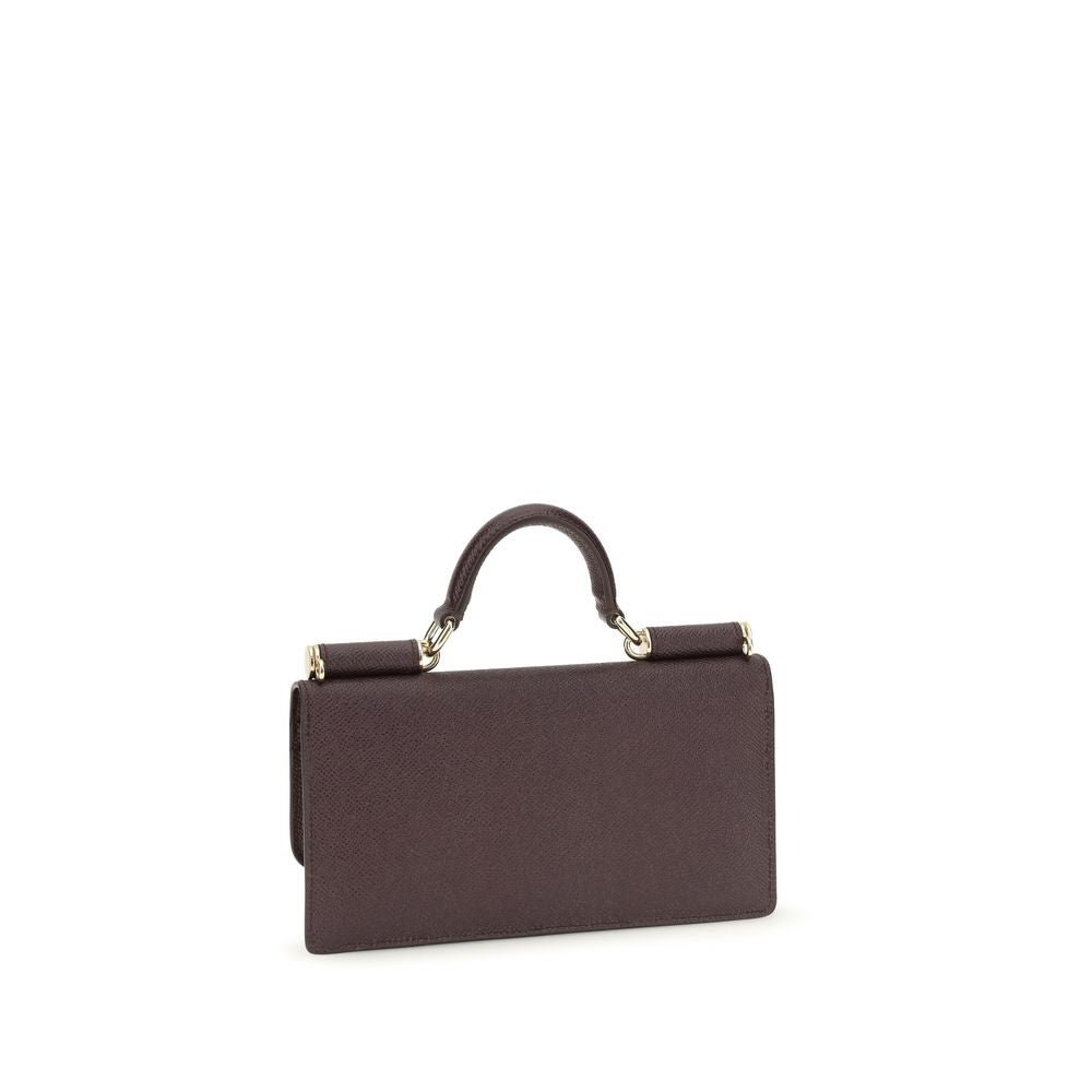 Micro Shoulder Flap Bag by Dolce & Gabbana for women in bos taurus calf leather brown & signature presents a versatile silhouette, showcasing a secure flap, magnetic & button and versatile with versatile shoulder-strap & handle for a sophisticated look.
