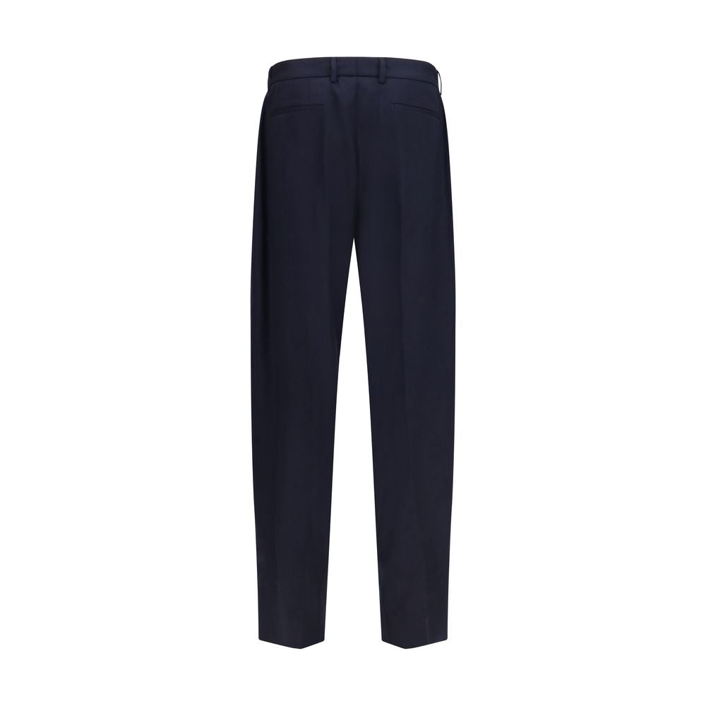 Trousers by Dolce & Gabbana for men in merino wool flannel blue presents a perennial silhouette, meticulously tailored with a regular-fit cut, long finish, and an elegant .