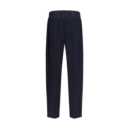 Trousers by Dolce & Gabbana for men in merino wool flannel blue presents a perennial silhouette, meticulously tailored with a regular-fit cut, long finish, and an elegant .