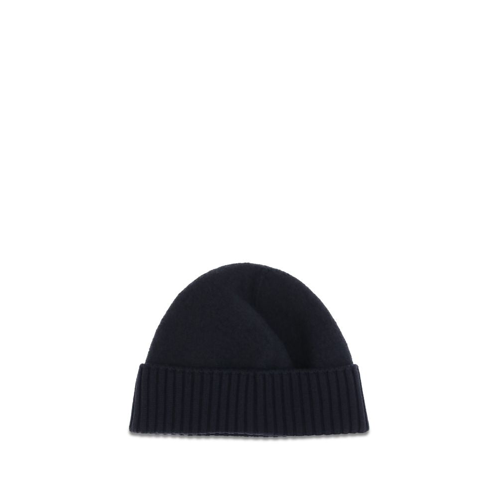 Beanie Hat by Dolce & Gabbana for men in wool black presents a urban-chic silhouette, artfully capturing the essence of the urban-chic Wool Beanie Hat design for a sophisticated look.