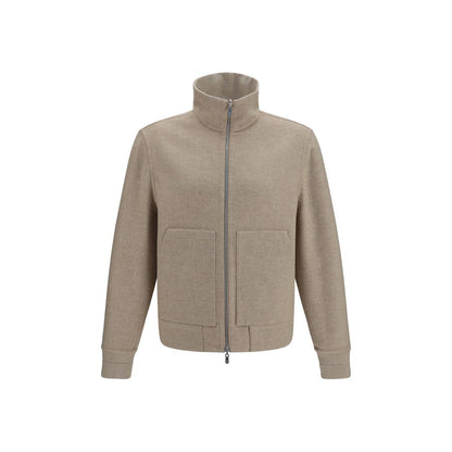 Overcoat by Brunello Cucinelli for men in cashmere & capra leather beige showcases a enveloping silhouette, detailed with distinctive pockets and a enveloping high-collar neckline.