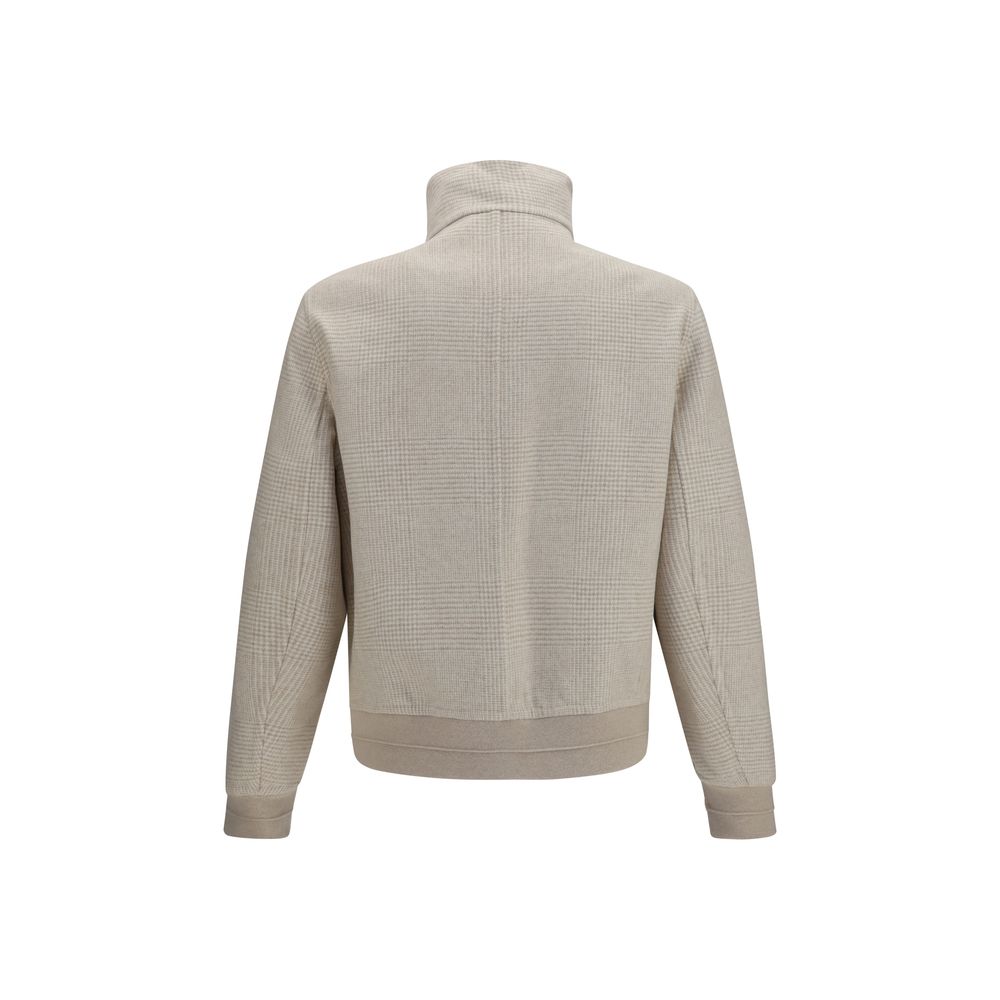 Overcoat by Brunello Cucinelli for men in cashmere & capra leather beige presents a luxurious silhouette, showcasing a luxurious high-collar neckline and sophisticated pockets for a premium, luxurious look.
