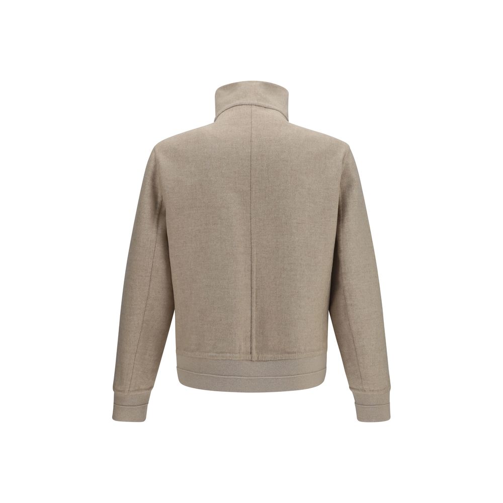 Overcoat by Brunello Cucinelli for men in cashmere & capra leather beige showcases a architectural silhouette, artfully detailed with a distinctive high-collar neckline and functional pockets for a architectural finish.