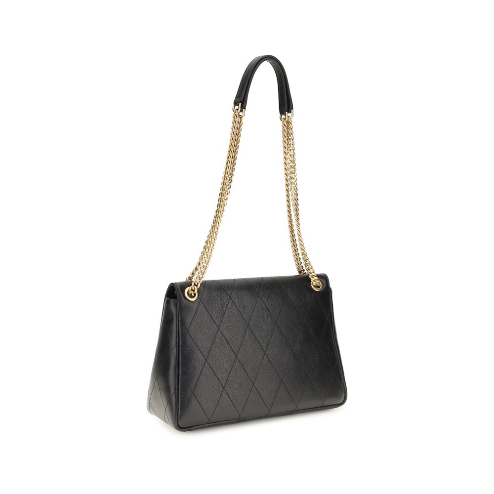 Shoulder Bag by Tory Burch for women in bos taurus calf grained & suede leather black features a effortless sophistication silhouette, secured by a zipper & magnetic with ample and versatile shoulder-strap for a effortless sophistication finish.