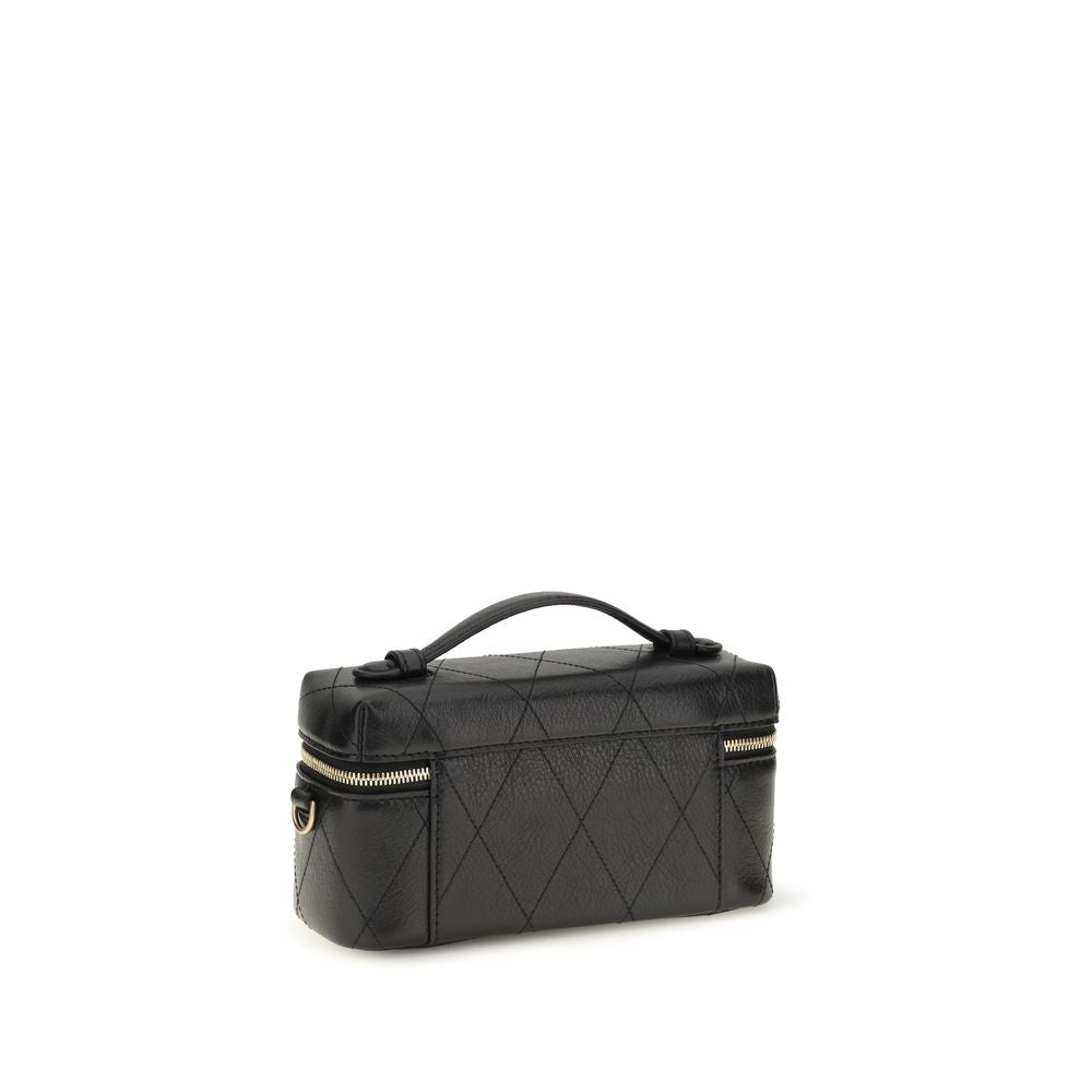 Quilted Makeup Bag by Tory Burch for women in bos taurus calf grained leather black showcases a dramatic silhouette from the Charlie Bos Taurus Calf Grained Leather Quilted Makeup Bag collection, detailed with a secure zipper, , and versatile adjustable-strap & handle.