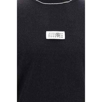 Sweater by MM6 for men in merino wool black features an tactile silhouette, showcasing a sophisticated turtle neckline and tactile for a refined finish.
