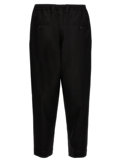 Trousers by Marni for men in virgin wool black features a artisanal silhouette, showcasing a sophisticated cropped with a cropped and for a artisanal finish.