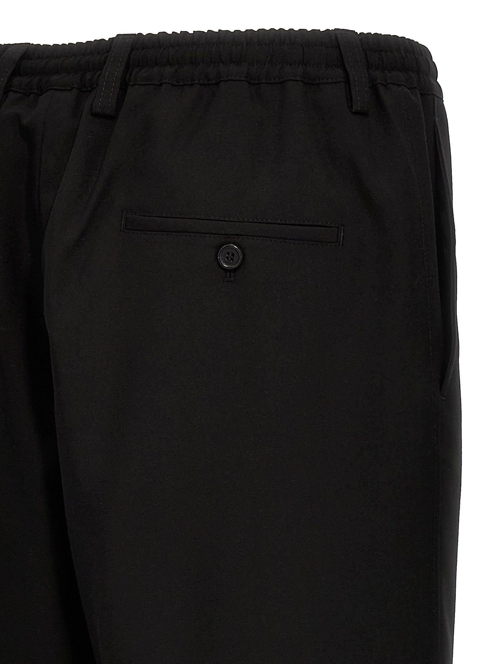 Trousers by Marni for men in virgin wool black presents a smart silhouette, meticulously detailed with a smart cropped, a smart cropped, and a smart .