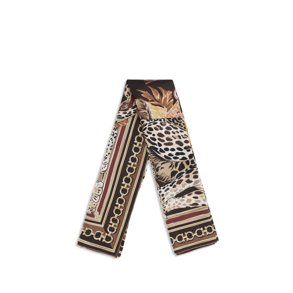 Scarf by Ferragamo for women in silk multicolor, patterned & print showcases a eye catching silhouette, artfully capturing the essence of the eye catching Gancini Silk Foulard Scarf design for a sophisticated look.