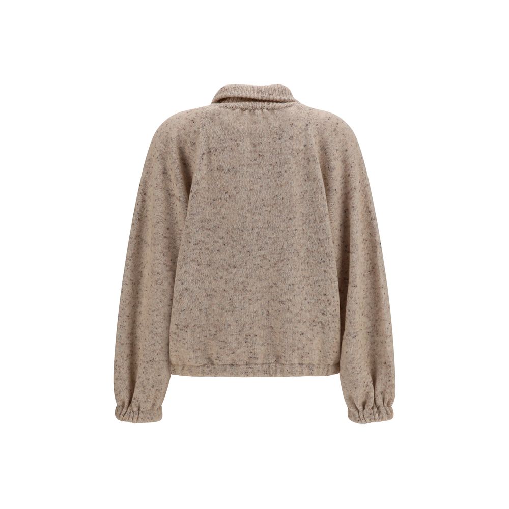 This Bomber Jacket by Fabiana Filippi for women in polyamide mohair merino & alpaca wool beige exhibits a edgy silhouette, meticulously detailed with functional and a edgy high-collar neckline for a edgy finish.