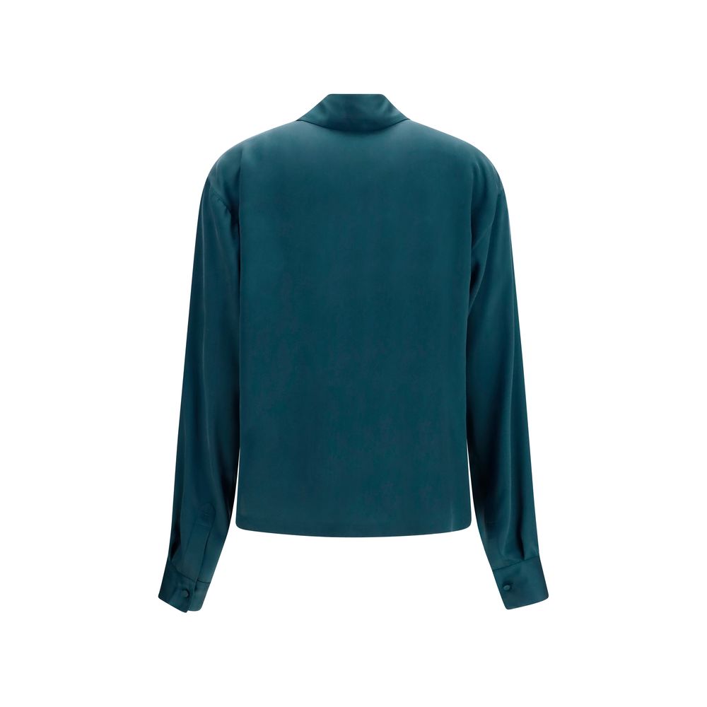 Dress Shirt by Tom Ford for women in silk blue features an architectural silhouette with a refined and elegant v-neck neckline for a architectural look.