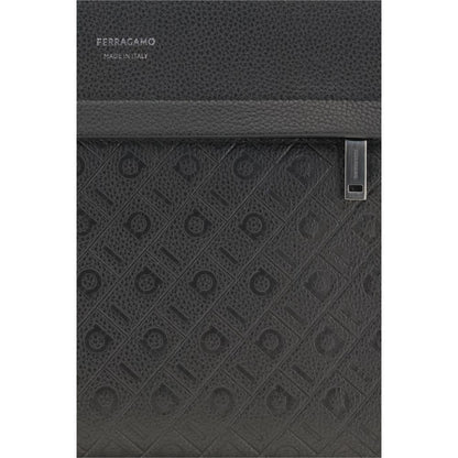 Pouch Handbag by Ferragamo for unisex in bos taurus calfskin leather black & monogram features an refined silhouette, showcasing a secure zipper, ample , and versatile wristlet for a sophisticated refined aesthetic.
