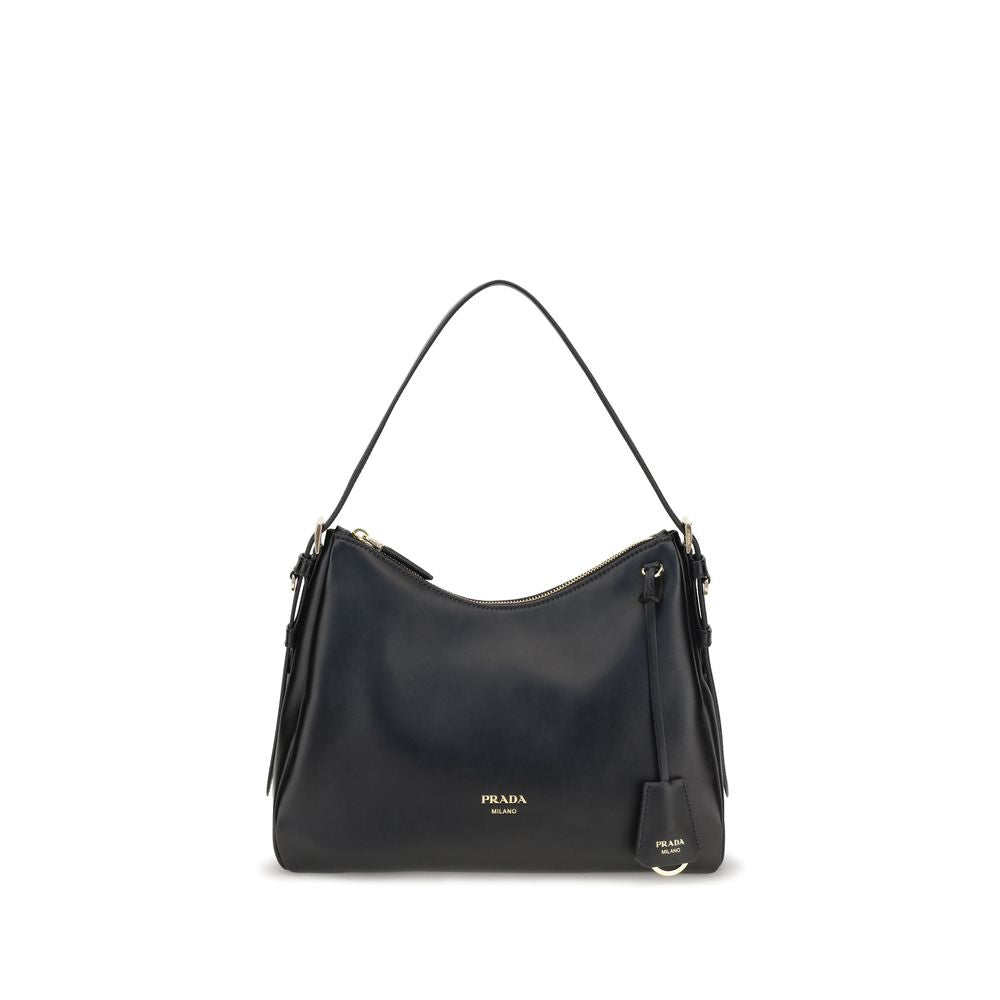 Shoulder Bag by Prada for women in bos taurus calf leather black features a effortless chic silhouette with a secure zipper, ample , and versatile shoulder-strap & adjustable-strap for a effortless chic finish.