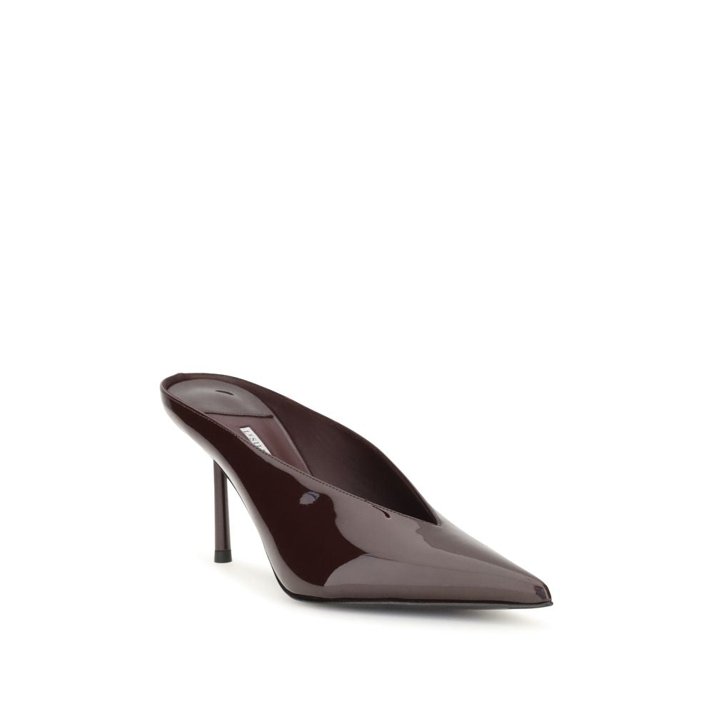 Mules Flat Shoes by LE SILLA for women in bos taurus calf leather bordeaux showcases a dynamic silhouette, artfully capturing Women's Bos Taurus Calf Leather Mules Flat Shoes through its distinctive and elegant pointed toe style.