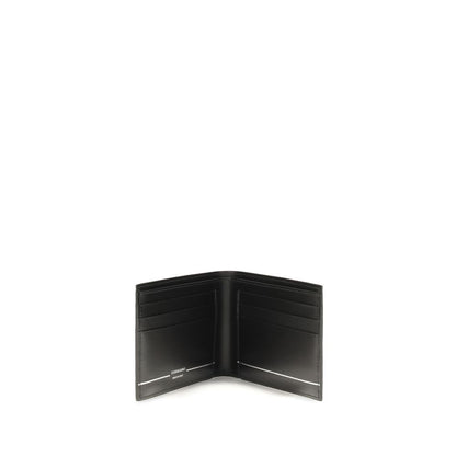 Cardholder Wallet by Ferragamo for men in bos taurus calf leather black, white & striped showcases a distinguished silhouette, artfully capturing the essence of the distinguished Bos Taurus Calf Leather Cardholder Wallet design with functional card-organization bifold.