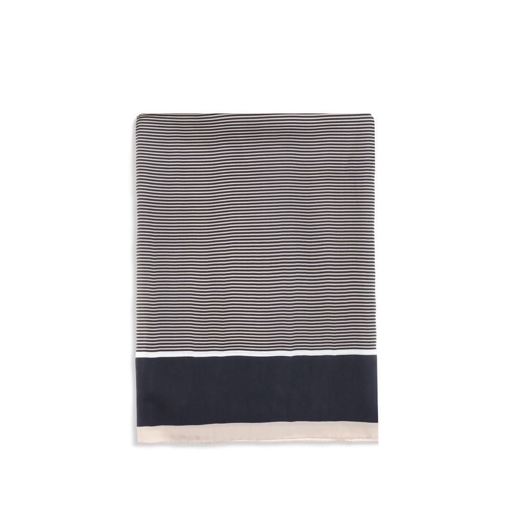 Scarf by Saint Laurent for women in silk blue, transparent, signature & striped presents a effortlessly chic silhouette, artfully capturing the essence of the effortlessly chic Cassandre Silk Stole Scarf design for a sophisticated look.