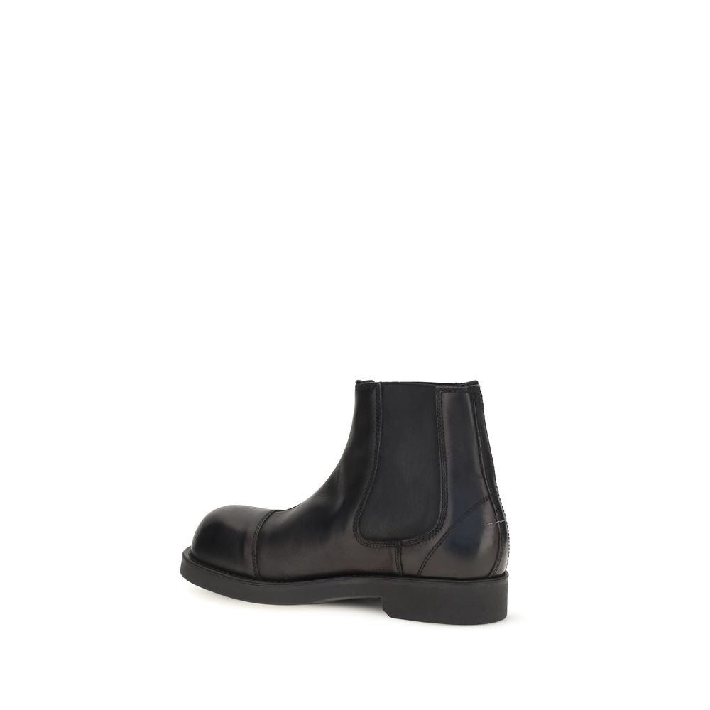 Biker Chelsea Boots by MM6 for men in bos taurus calfskin leather black, white & signature features an avant-garde Men's Bos Taurus Calfskin Leather Biker Chelsea Boots silhouette, defined by a sophisticated and a avant-garde .