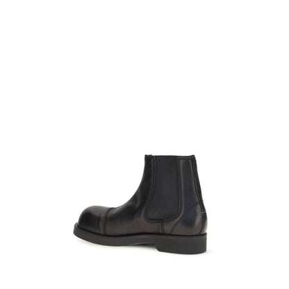 Biker Chelsea Boots by MM6 for men in bos taurus calfskin leather black, white & signature features an avant-garde Men's Bos Taurus Calfskin Leather Biker Chelsea Boots silhouette, defined by a sophisticated and a avant-garde .