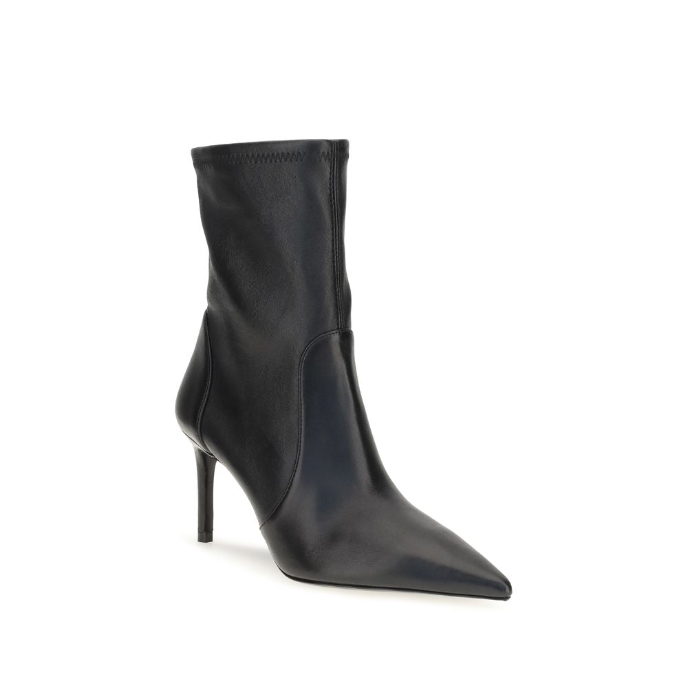 Stiletto Ankle Boots by Stuart Weitzman for women in bos taurus calf leather black & natural features an enchanting design from the Women's Bos Taurus Calf Leather Stiletto Ankle Boots collection, highlighting a enchanting stiletto and pointed toe style for a refined look.