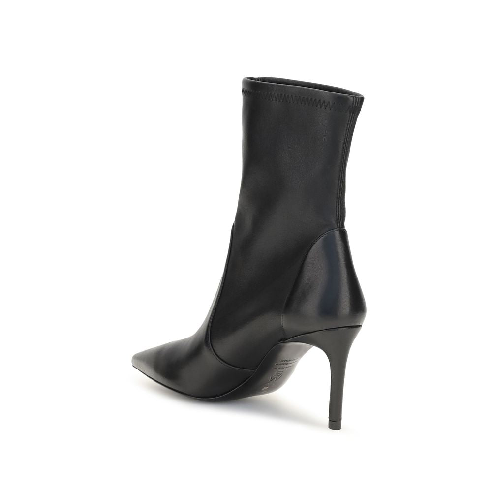 Stiletto Ankle Boots by Stuart Weitzman for women in bos taurus calf leather black & natural features an effortless chic silhouette from the Women's Bos Taurus Calf Leather Stiletto Ankle Boots collection, showcasing a effortless chic stiletto and refined pointed toe style for an effortless chic look.
