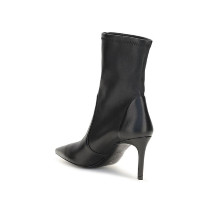 Stiletto Ankle Boots by Stuart Weitzman for women in bos taurus calf leather black & natural features an effortless chic silhouette from the Women's Bos Taurus Calf Leather Stiletto Ankle Boots collection, showcasing a effortless chic stiletto and refined pointed toe style for an effortless chic look.