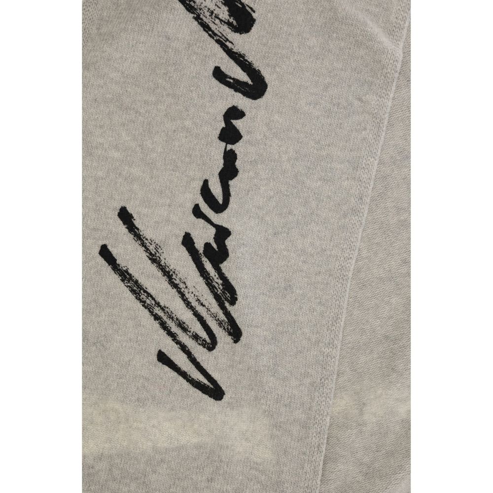 Scarf by MM6 for women in wool gray & signature presents a effortlessly chic silhouette, artfully capturing the essence of the effortlessly chic Wool Scarf design for a sophisticated look.