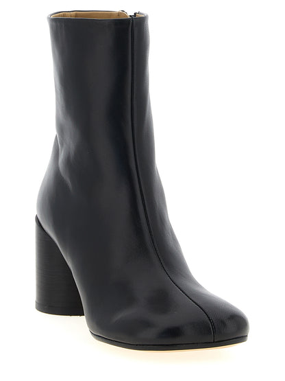 Ankle Boots by MM6 Maison Margiela for women in polyester nappa leather black, white & signature features an effortless chic silhouette from the Women's Polyester Nappa Leather Ankle Boots collection, showcasing a effortless chic block-heel and refined for an effortless chic look.