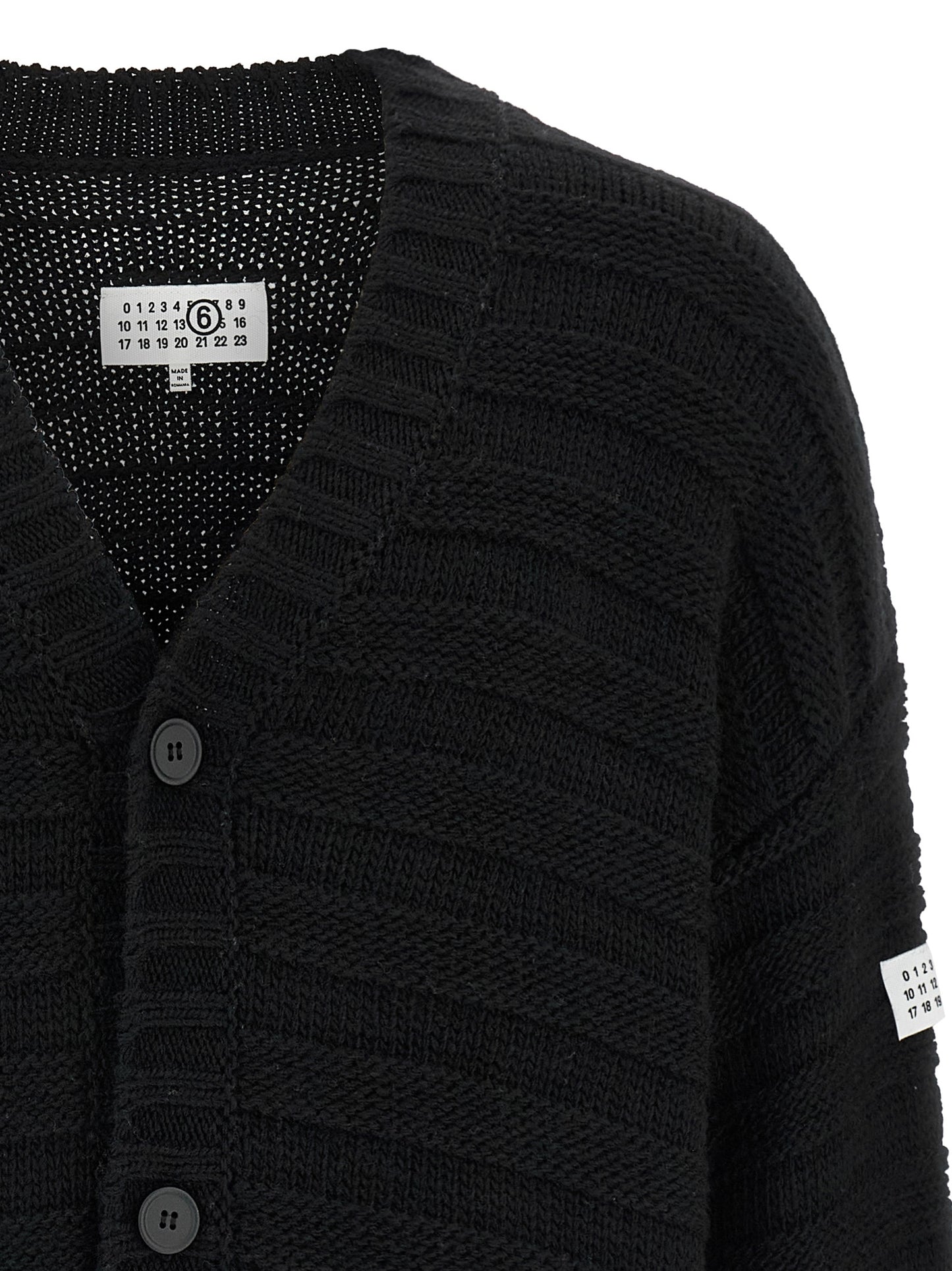 Cardigan by MM6 Maison Margiela for men in acrylic virgin wool black, white & signature features a dramatic silhouette, showcasing a sophisticated v-neck neckline and dramatic detail for a timeless, premium look.