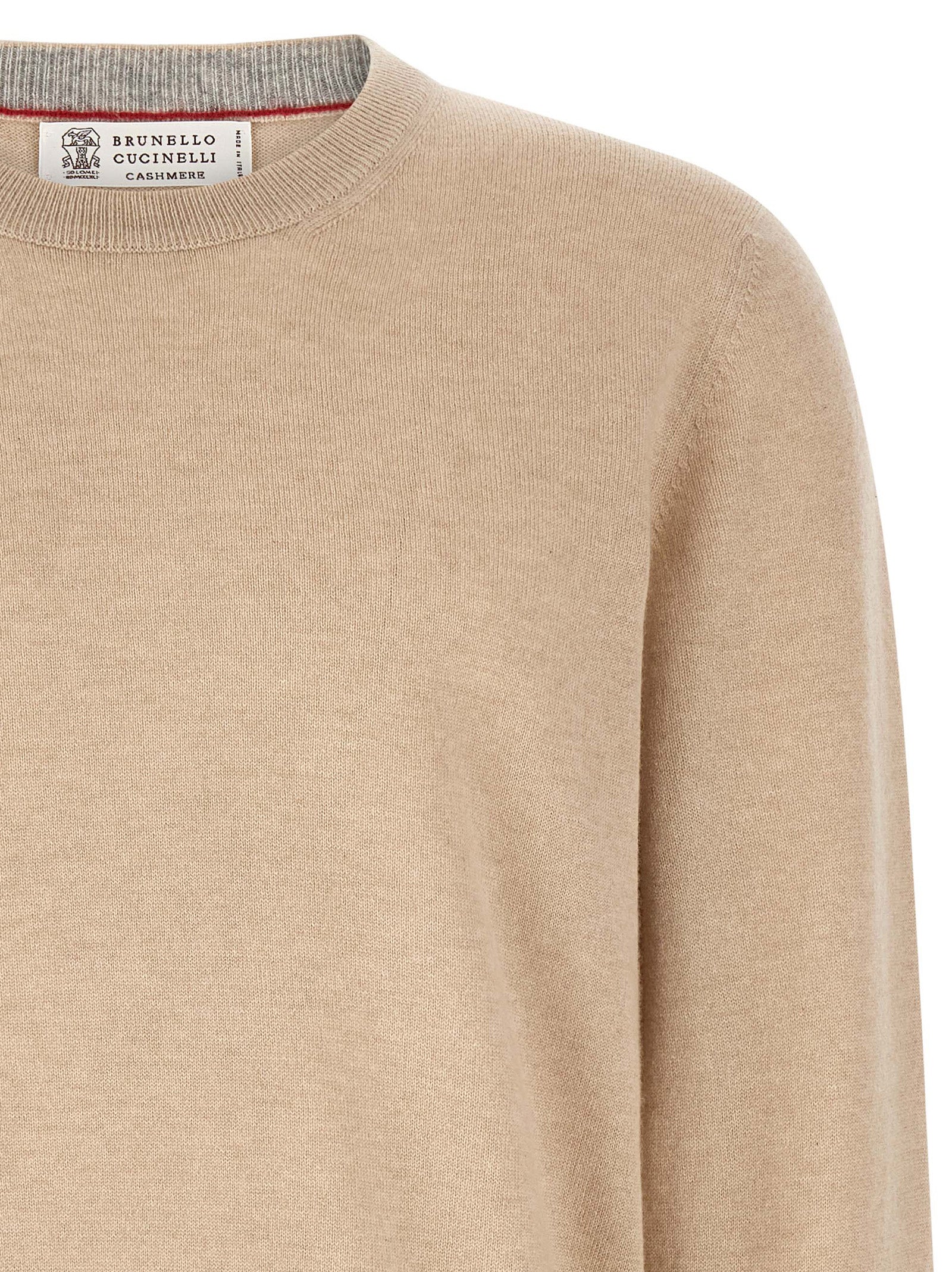 Cardigan by Brunello Cucinelli for men in cashmere beige features a nuanced silhouette with a refined crew neckline and nuanced detailing for a sophisticated look.