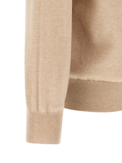 Cardigan by Brunello Cucinelli for men in cashmere beige features an impeccable silhouette, showcasing a sophisticated and detail for a truly impeccable finish.
