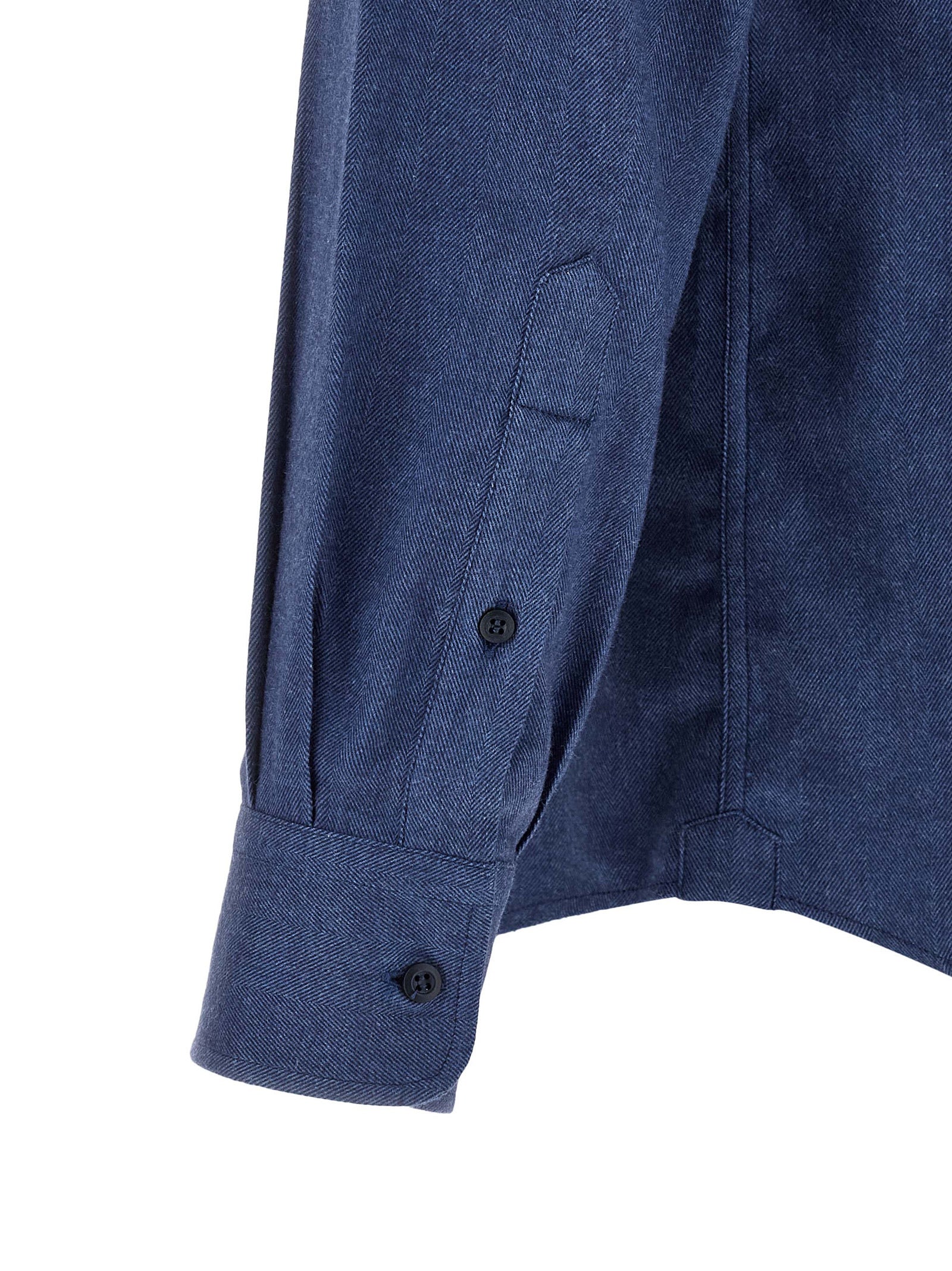 Shirt by Brunello Cucinelli for men in cotton & lyocell blue, pearl & herringbone showcases a sharp silhouette, elegantly detailed with a sharp and sharp .