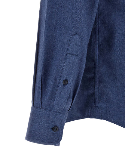 Shirt by Brunello Cucinelli for men in cotton & lyocell blue, pearl & herringbone showcases a sharp silhouette, elegantly detailed with a sharp and sharp .