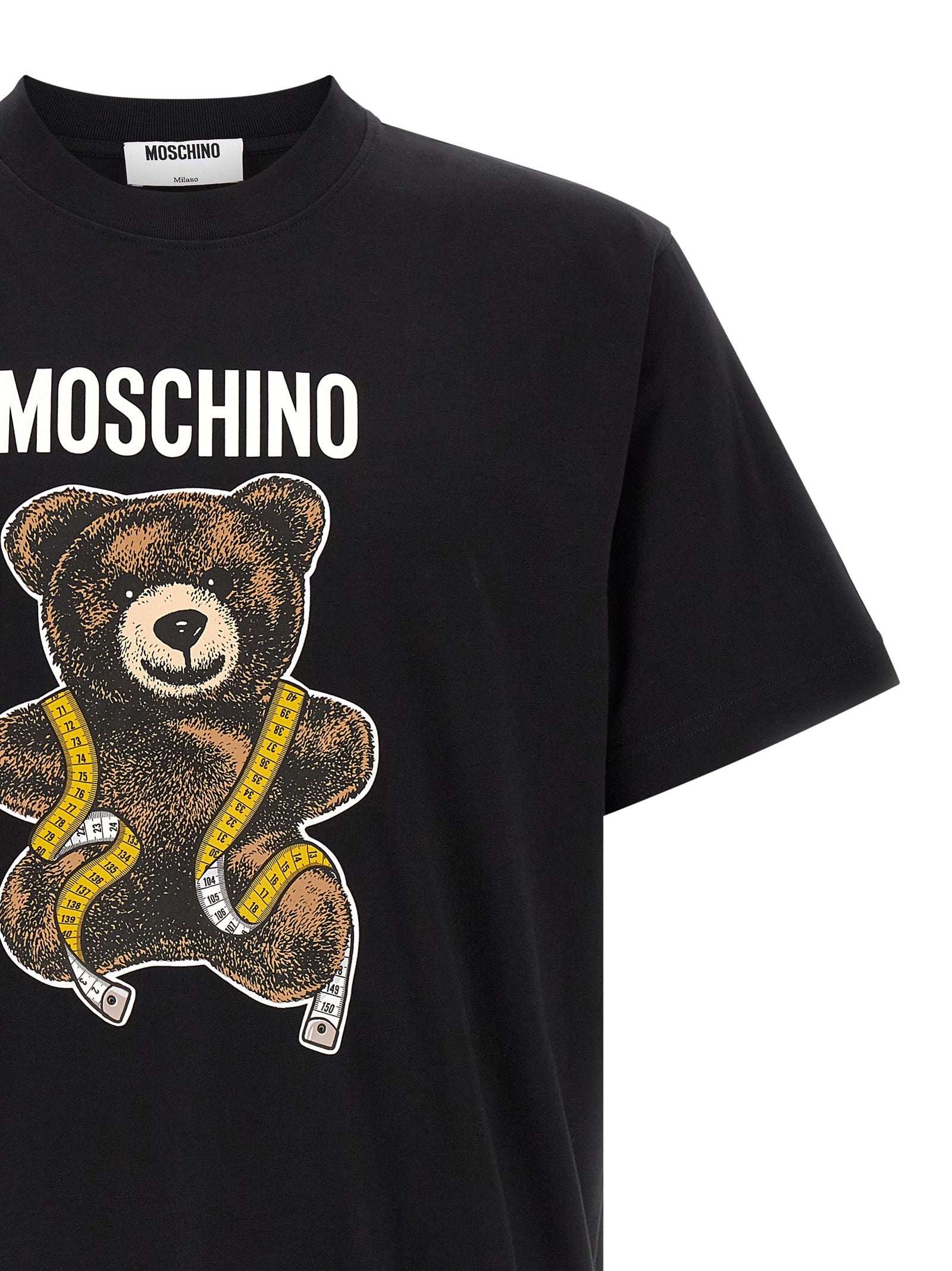 T-Shirt by Moschino for men in cotton black & yellow features a plush silhouette, showcasing a sophisticated and for a truly plush finish.