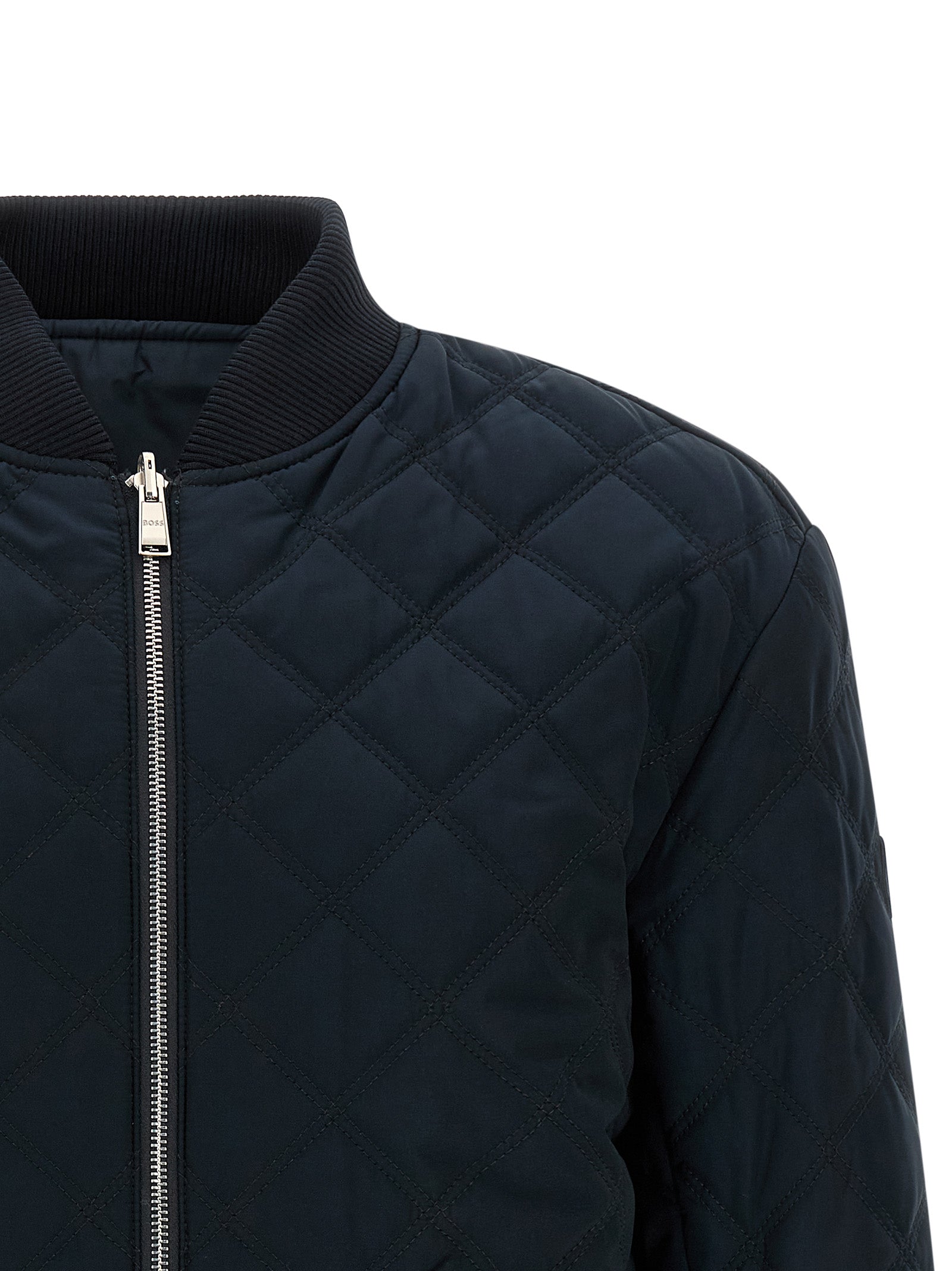 Bomber Jacket by Hugo Boss for men in polyester blue & signature features a city-ready silhouette, detailed with pockets and a city-ready high-neck neckline.