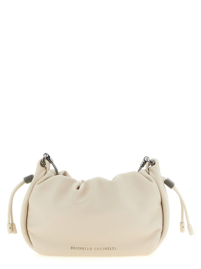 Mini Crossbody Bucket Handbag by Brunello Cucinelli for women in lamb leather gold, white & signature features a transformative elegance silhouette, showcasing a secure drawstring, organized , and versatile crossbody-strap & shoulder-strap for a transformative elegance look.