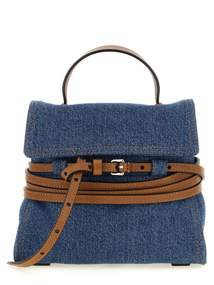Small Handbag by Moschino for women in calf leather & cotton blue & brown features a signature silhouette, showcasing a secure and signature with versatile shoulder-strap, handle & adjustable-strap for a sophisticated look.