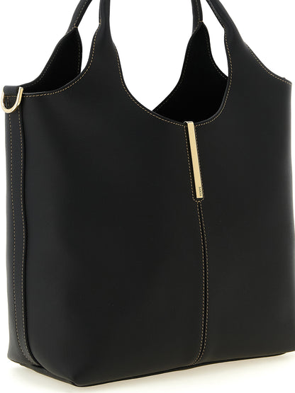This Small Tote Bag by Tod's for women in calfskin leather black & gold features an on trend Calfskin Leather Small Tote Bag design with a secure hook, ample , and on trend shoulder-strap, handle & detachable-strap.