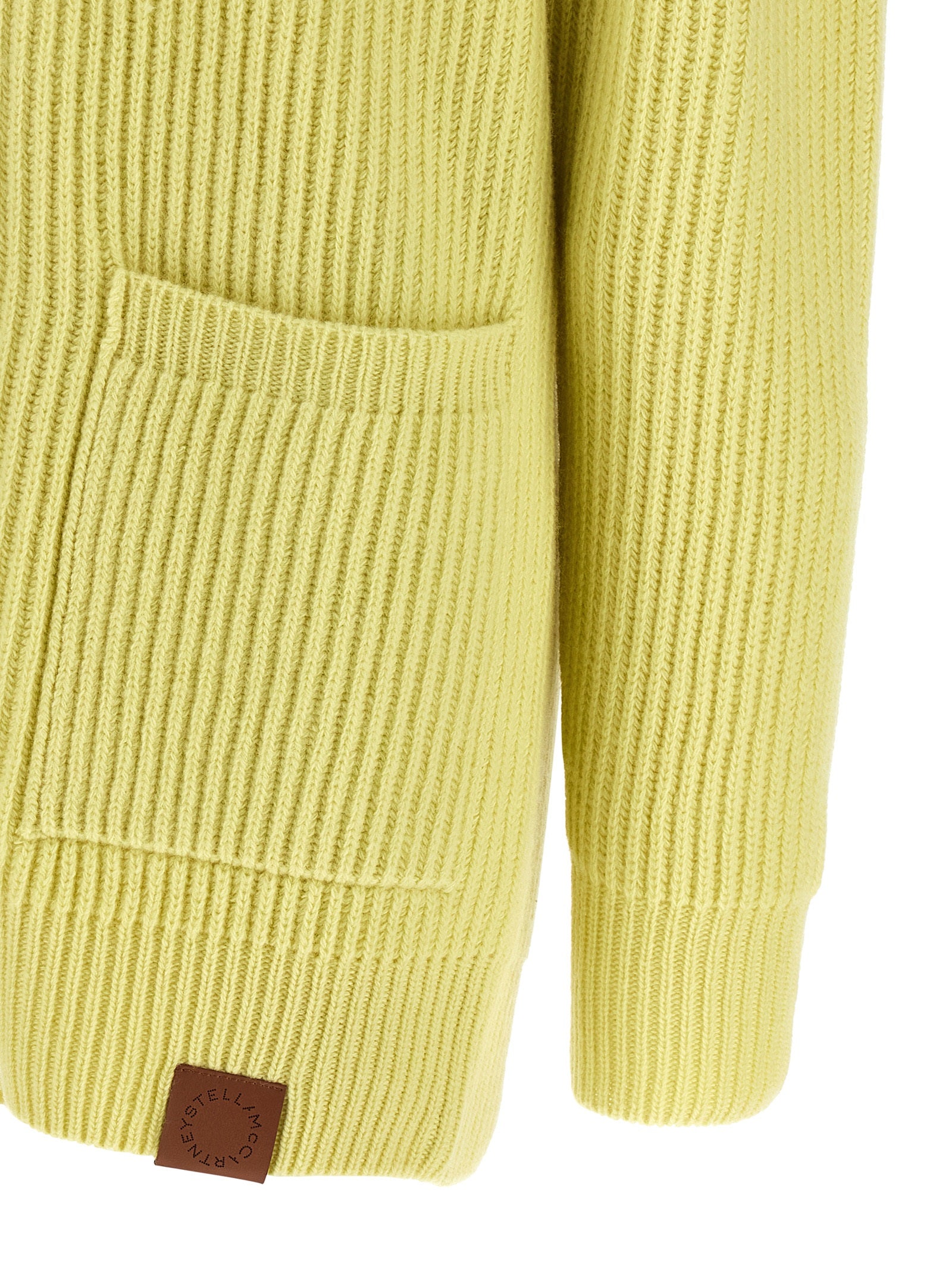 Cardigan by Stella McCartney for women in virgin wool & leather bicolour & yellow presents a textural silhouette, artfully finished with a textural and for a sophisticated, textural look.