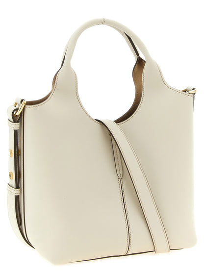 Mni Tote Bag by Tod's for women in suede calfskin leather cream, gold & white features a distinguished Suede Calfskin Leather Mni Tote Bag design, complete with a secure hook, ample , and versatile shoulder-strap, handle & adjustable-strap for a distinguished look.