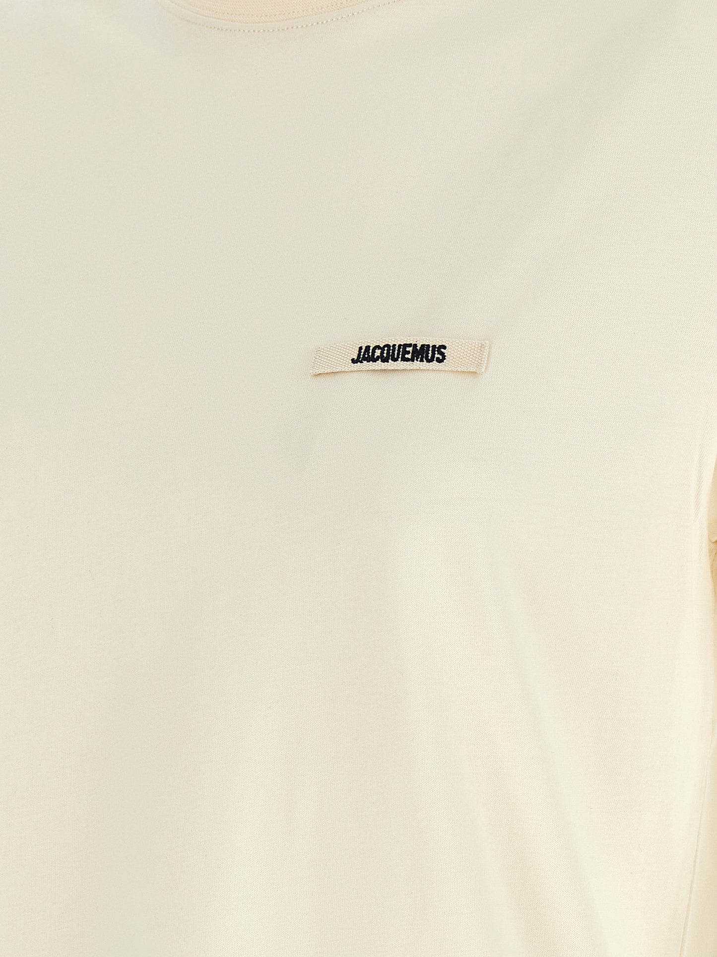 T-Shirt by Jacquemus for women in cotton beige, black & signature showcases a unassuming silhouette, artfully detailed with a refined and unassuming for a sophisticated, contemporary look.