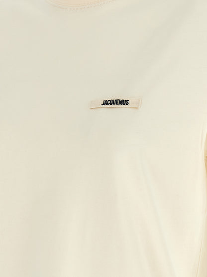 T-Shirt by Jacquemus for women in cotton beige, black & signature showcases a unassuming silhouette, artfully detailed with a refined and unassuming for a sophisticated, contemporary look.