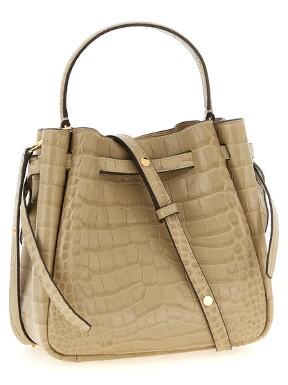 Small Bucket Shoulder Bag by Tory Burch for women in croc skin bos taurus suede calf leather beige, gold & print features a distinguished silhouette, showcasing a secure magnetic and distinguished with versatile shoulder-strap, handle & adjustable-strap for a distinguished finish.