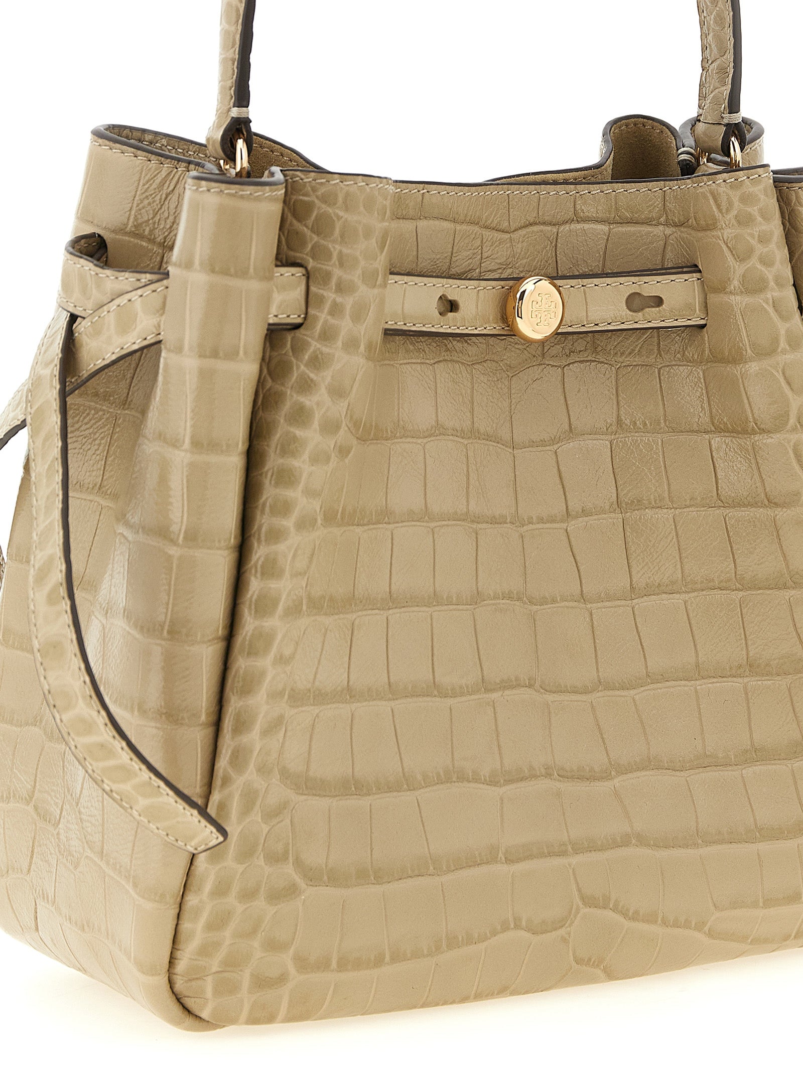 Small Bucket Shoulder Bag by Tory Burch for women in croc skin bos taurus suede calf leather beige, gold & print features a effortless chic silhouette with a secure magnetic, ample , and versatile shoulder-strap, handle & adjustable-strap for a effortless chic finish.
